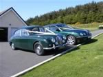 Jaguar Mark 2 and Jaguar S-Type, both in British Racing Green