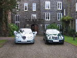 Silvery Blue and British Racing Green Jaguar S-Types at a wedding in November 2009