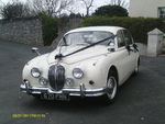 1965 Old English White Jaguar Mark 2 at a wedding on 31 March 2012