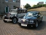 1929 Essex and Chrysler 300 Saloon at a wedding in August 2013